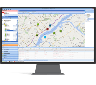 Monitor displaying a map with colored pins and a left navigation panel plus a data table, as in fleet/tracking software